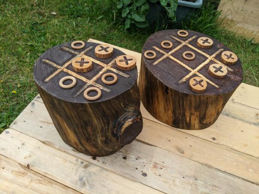 Noughts and crosses log stump